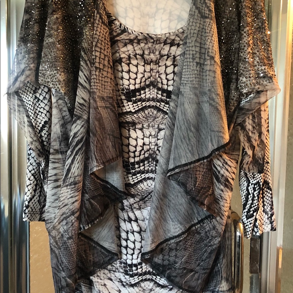Cocktail dress in animal print with rhinestones and mock jacket
